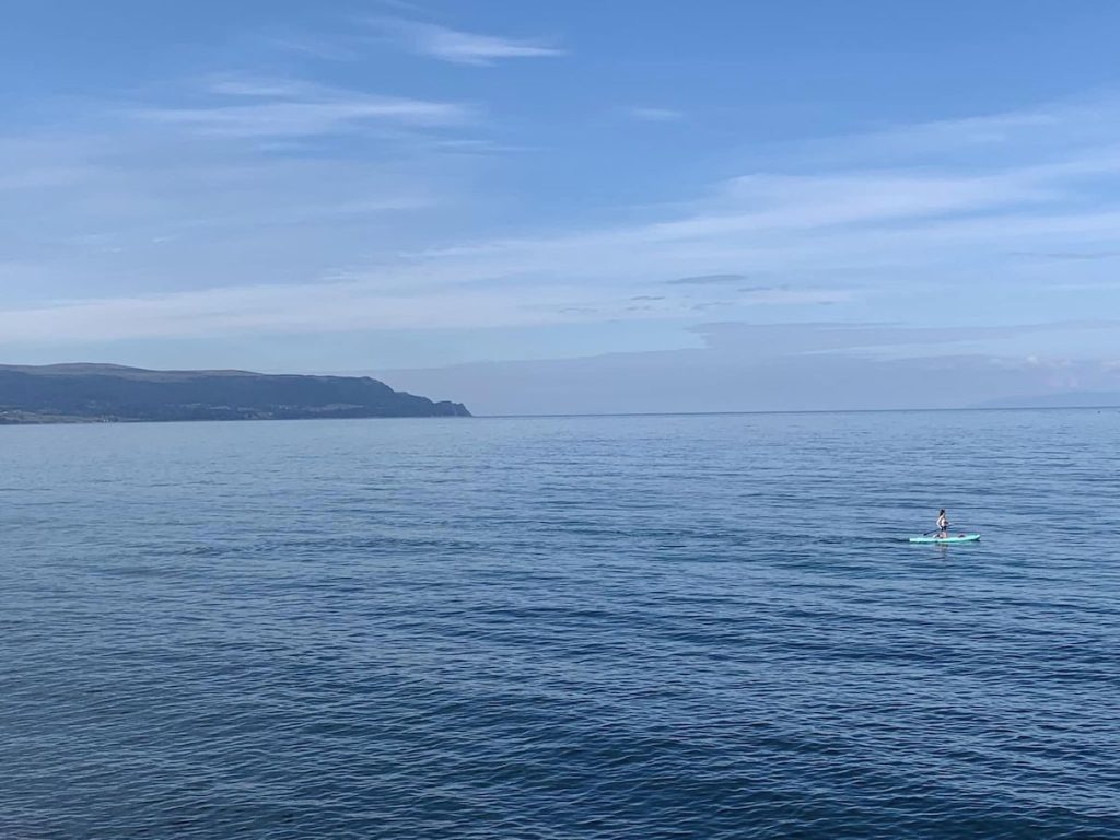 woman paddleboarder in the sea paddleboard northern ireland